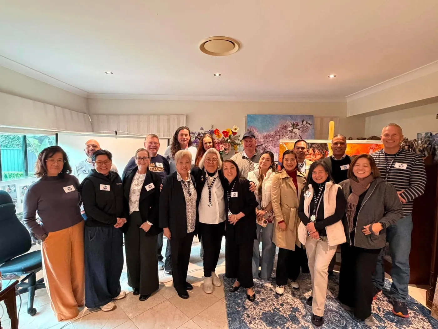 Daisy Ann Foundation members gathered together at a community meeting